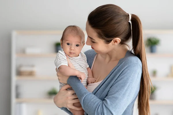 Portrait Of Happy Young Mother Holding Cute Little Infant Child In Hands — Stock Photo, Image