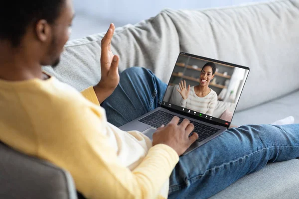 African american man having online party with his girlfriend — Stock Photo, Image