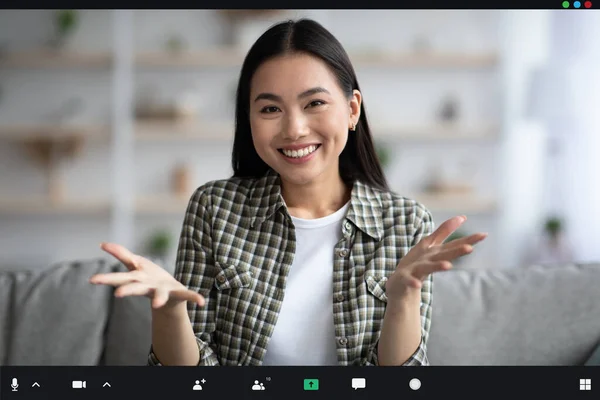 Cheerful asian lady attending video conference, pov screen, copy space — Fotografia de Stock