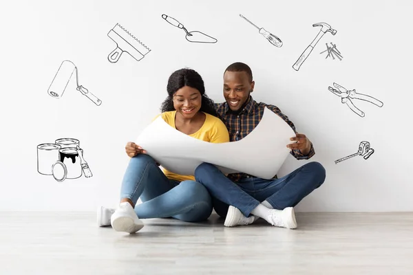 Home Renovation Plan. Excited Black Spouses Looking At Blueprints, Creative Collage — Stock Photo, Image