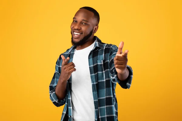 Positive Black Bearded Guy Pointing Fingers At Camera, Yellow Background