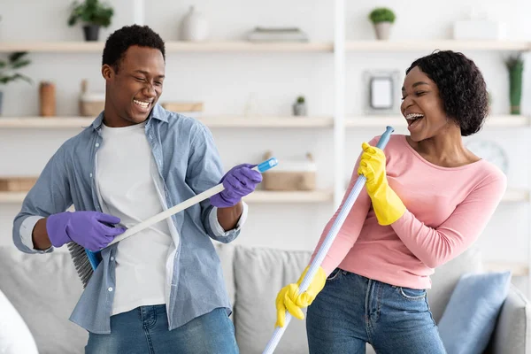 Funny african american family having fun while cleaning apartment, closeup — Stock Photo, Image