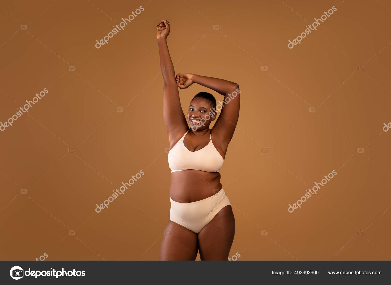 Self Acceptance, Love And Care. Portrait of confident fat black woman with  perfect skin and body posing isolated in studio background, free copy  space. Gorgeous Lady with chubby body enjoy herself Stock