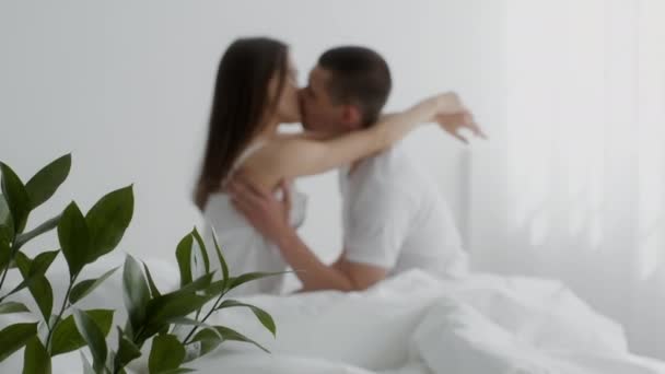 Young Passionate Couple Kissing In Bed, Slow Motion Footage — стокове відео