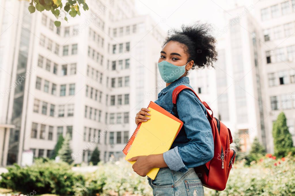 African American Female Student Wearing Surgical Face Mask Standing Outdoor