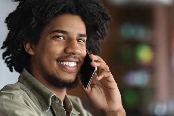 Portrait Of Young African American Guy Talking On Cellphone In Cafe, Closeup — 스톡 사진