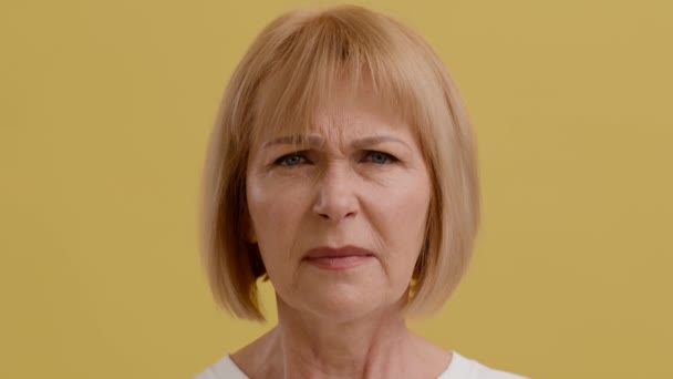 Disgusting Odour. Displeased Senior Woman Feeling Bad Smell, Frowning Face To Camera — Stock Video