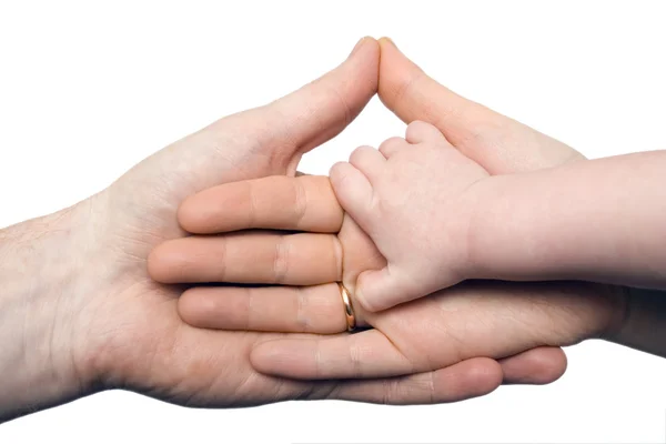 Baby's hand holding the hands of parents — Stock Photo, Image
