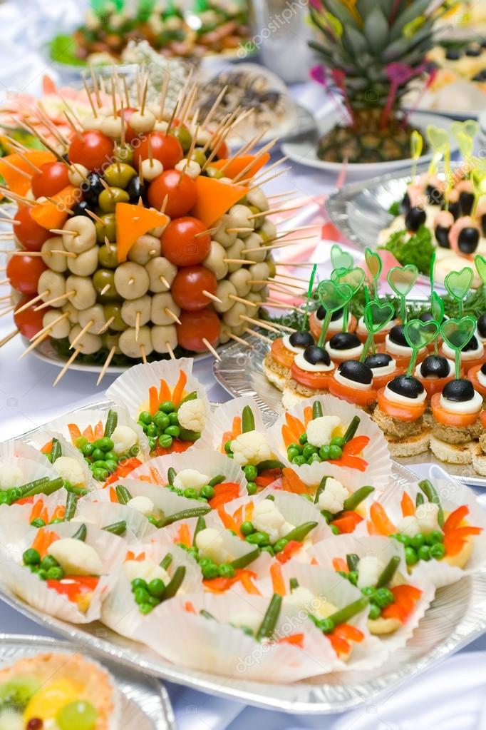 Catering buffet style different light snack and sandwiches — Stock