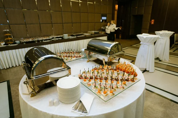 Catering - served table with various snacks, canape and appetize — Stock Photo, Image