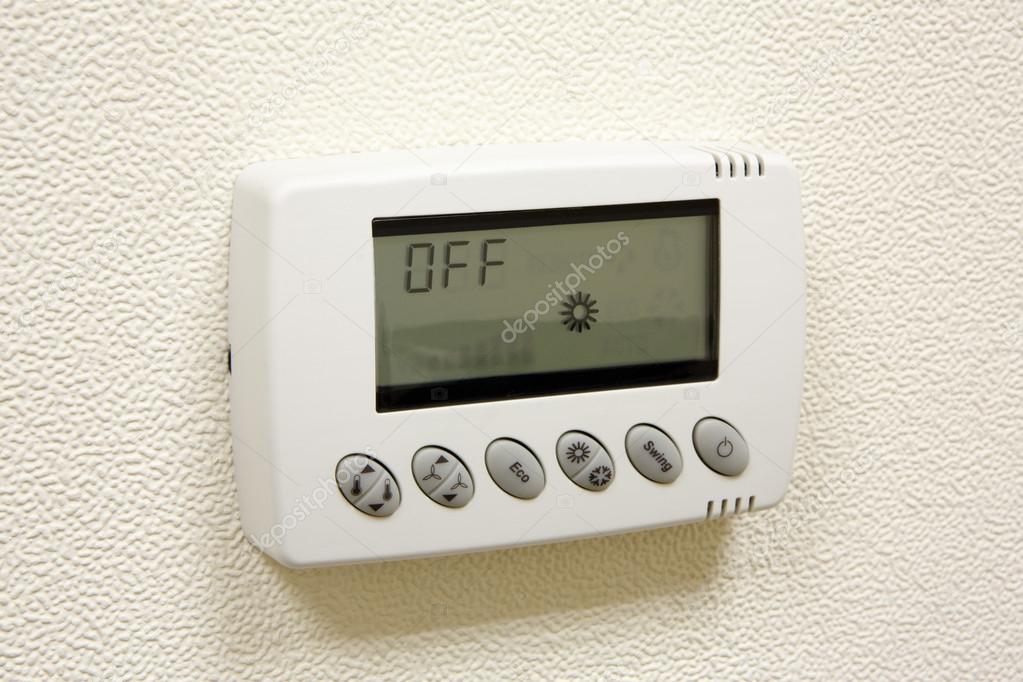 Digital climate thermostat on the wall
