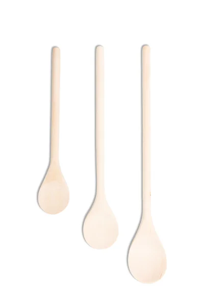 Three wooden spoons isolated at white — Stock Photo, Image