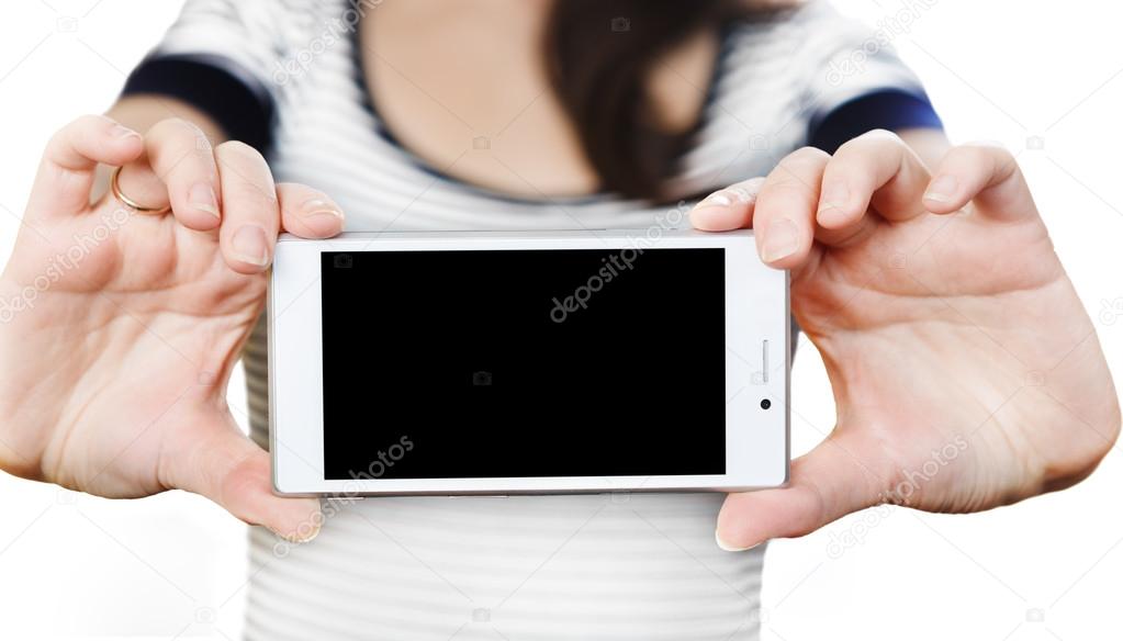 Woman's hands holding white smartphone