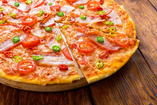 Delicious pizza with red and green hot chili peppers — Stock Photo, Image