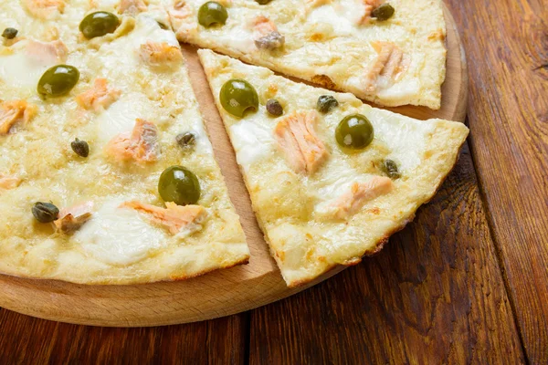 Delicious seafood pizza with olives — Stock Photo, Image