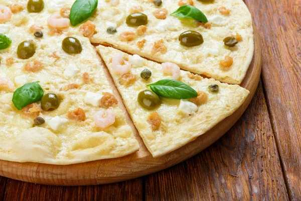 Delicious seafood pizza with olives — Stock Photo, Image