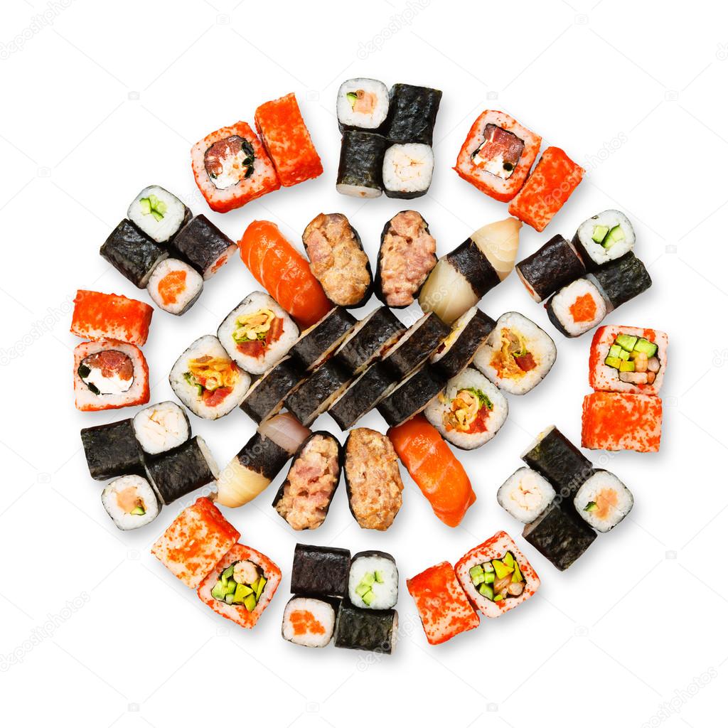 Set of sushi, maki, gunkan and rolls isolated at white