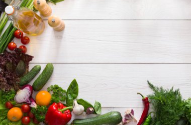 Vegetable background, copy space on white wood. Mockup for menu or recipe