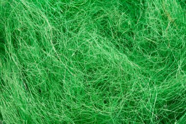 Yeşil yün doku. Keçe, doğal kumaş close-up. Parlak iğne işi arka plan, el yapımı kavramı