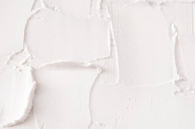 Beyaz tuğlalı duvar, sıva desenli. Soyut arkaplan, alçı dekoratif, iç tasarım, inşaat konsepti