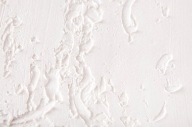 Beyaz duvar sıva desen arka plan ile. Dokulu zemin kısma. Ev tamir, iç tasarım konsepti