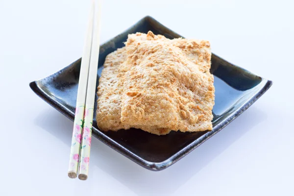 Biscoito de arroz siamês com fio dental de porco — Fotografia de Stock
