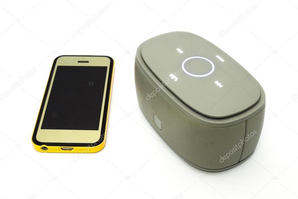 Gold smart phone and bluetooth speaker