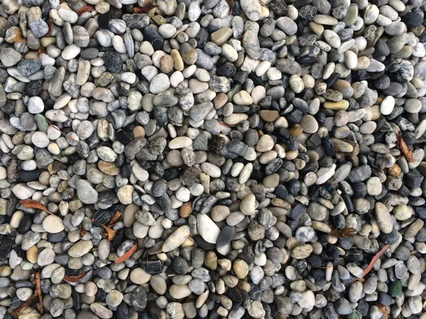 Галечные камни фон. Крупный план текстуры камней — стоковое фото