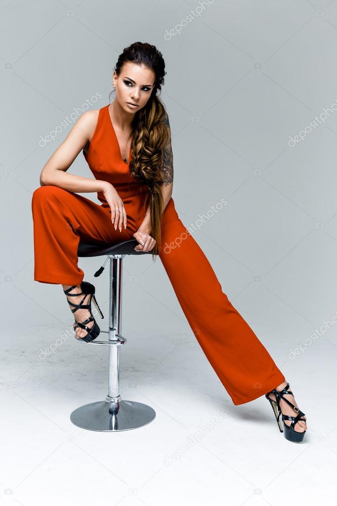  woman in red overalls 