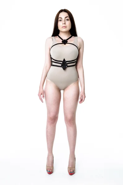 Brunette girl wearing bodysuit — Stock Photo, Image
