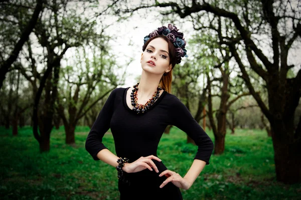 Sensual woman in floral wreath — Stock Photo, Image