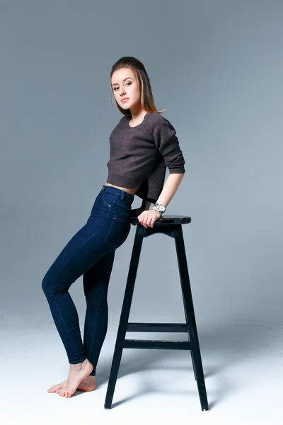 Beautiful woman in jeans — Stock Photo, Image