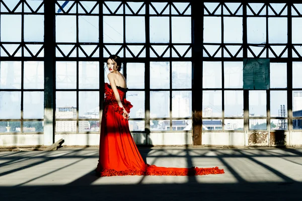 Woman wearing a red dress, — Stock Photo, Image