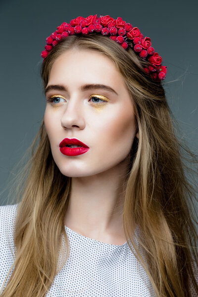 Sensual woman in floral wreath