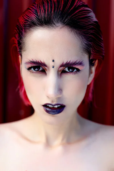 Attractive young woman with colorful makeup — Stock Photo, Image