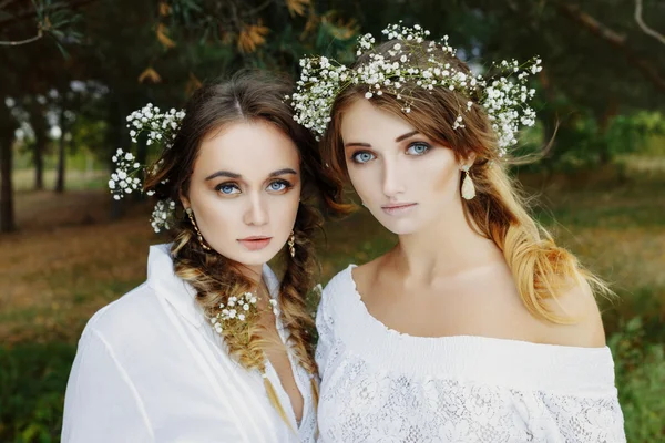 Two women in white dresses — Stock Photo, Image