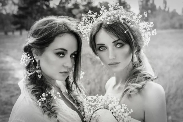 Two women in white dresses — Stock Photo, Image