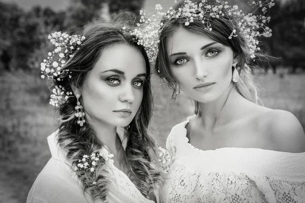 Two women in white dresses — Stock Photo, Image