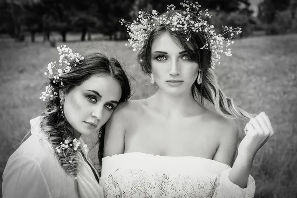 Two women in white dresses — Stock Photo, Image