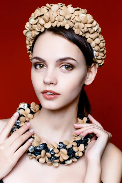 Model with a wreath of flowers — Stock Photo, Image