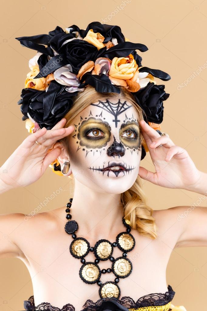 Woman with skull makeup Stock Photo by ©smmartynenko 88644038