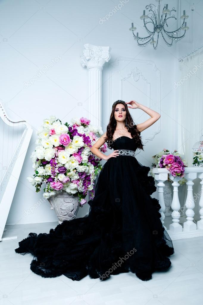 woman in a long black dress