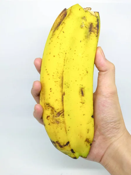 Mão Segurando Uma Banana Única Que Tem Dois Conteúdos Uma — Fotografia de Stock