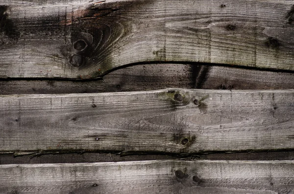 Grey Wooden fence - background textural grey rustic wooden fence — Stock Photo, Image