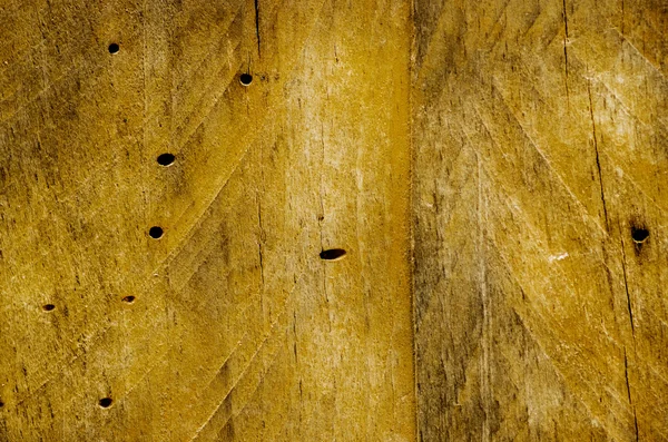Old wood damaged by borers — Stock Photo, Image