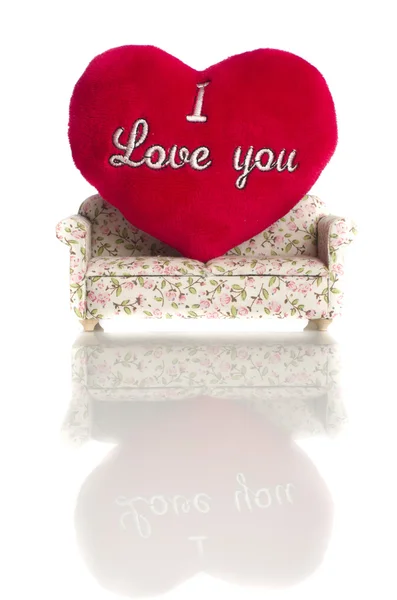 Red soft heart with sign I love you on small sofa isolated on white background. — Stock Photo, Image