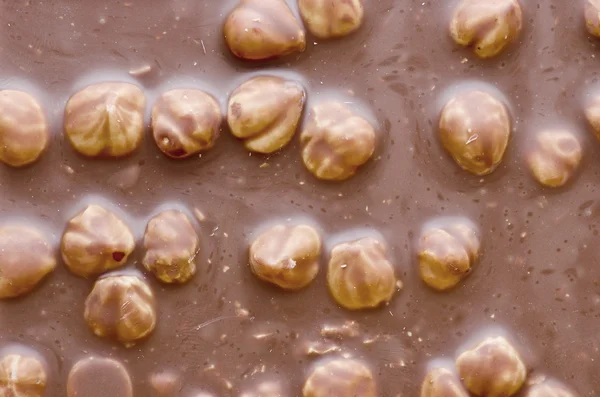 Fındıklı çikolata. Sütlü çikolata ve fındık arka plan/çikolata süt. 