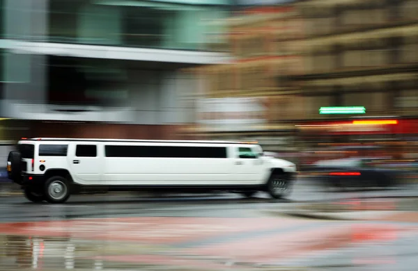 White Hummer h3 limousine blurred out 18.07.2008 Manchester, England editorial. — Stock Photo, Image