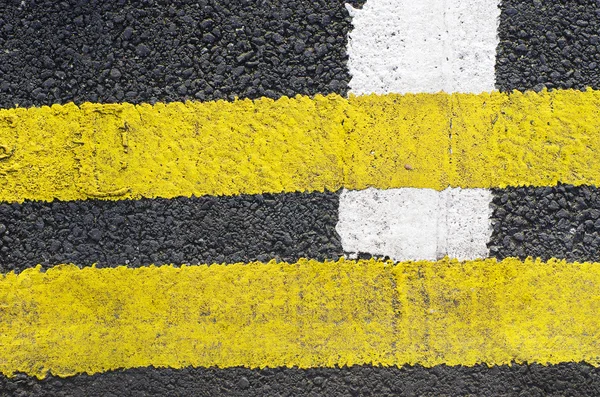 Líneas de tráfico en la superficie de la carretera de asfalto se compone de un tipo de fondo . — Foto de Stock