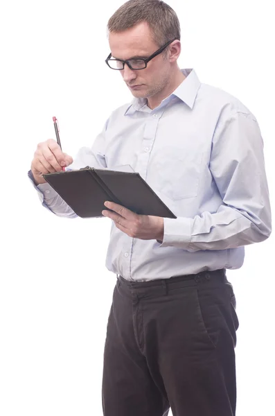 Businessman taking notes in his notebook — Stock Photo, Image